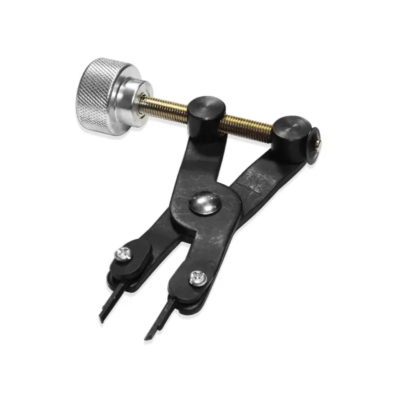 Przyrząd do zwalniania naprężonych sprzęgieł dwumasowych